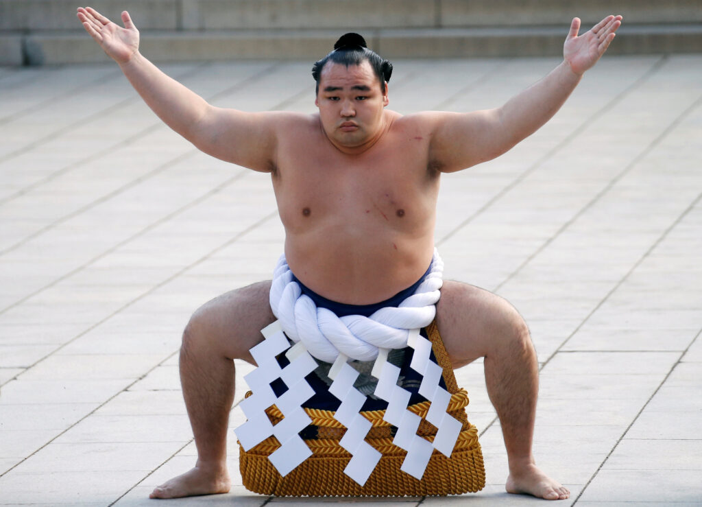 mongolian born grand sumo champion yokozuna kakuryu performs the new year's ring entering rite at the annual celebration for the new year at meiji shrine in tokyo
